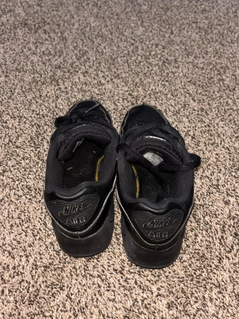 Nike Kids Black Low-Top Sneaker with Subtle Swoosh